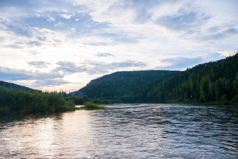 Sunset over the river Mana